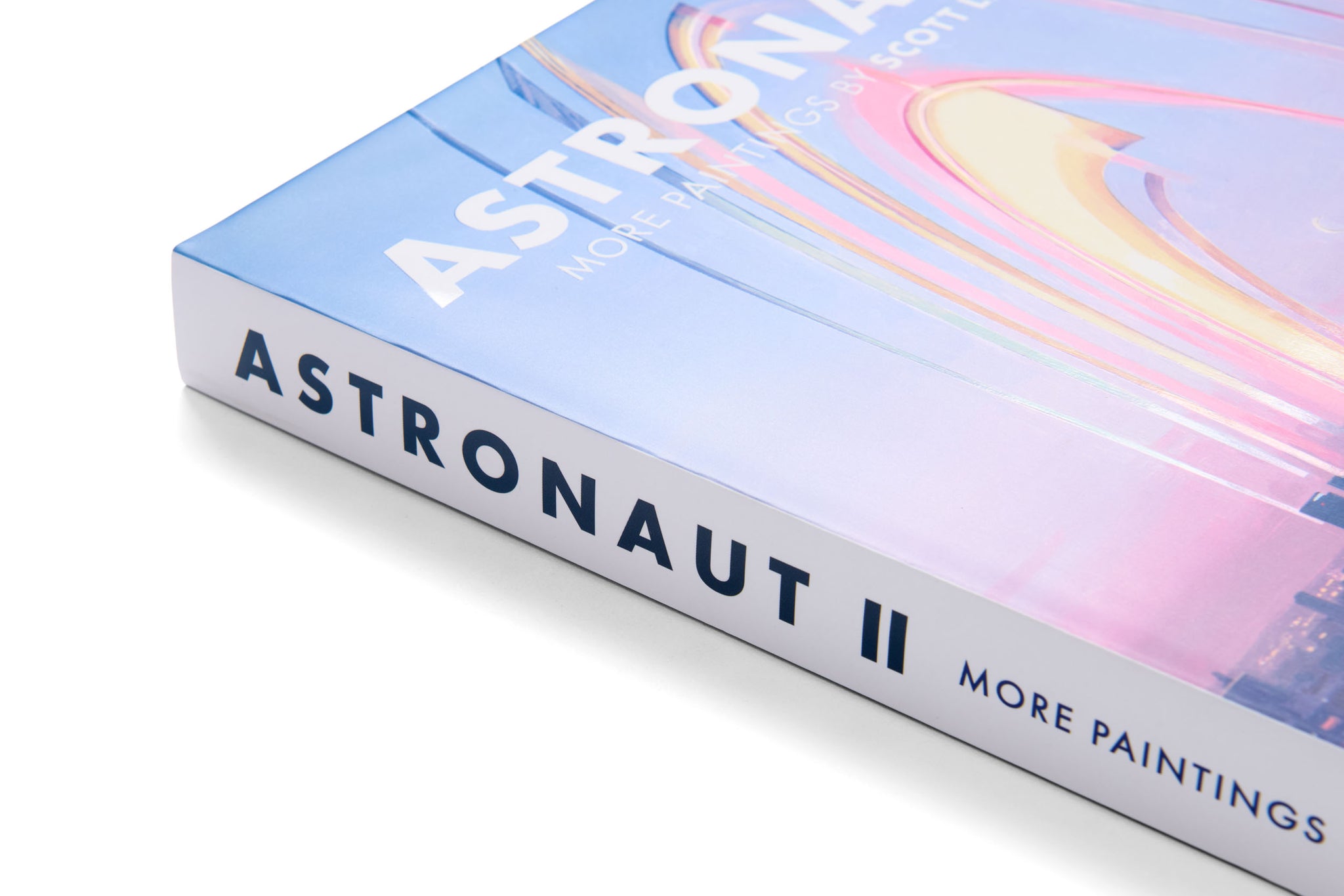 Book titled 'Astronaut II' with a colorful cover on a white background