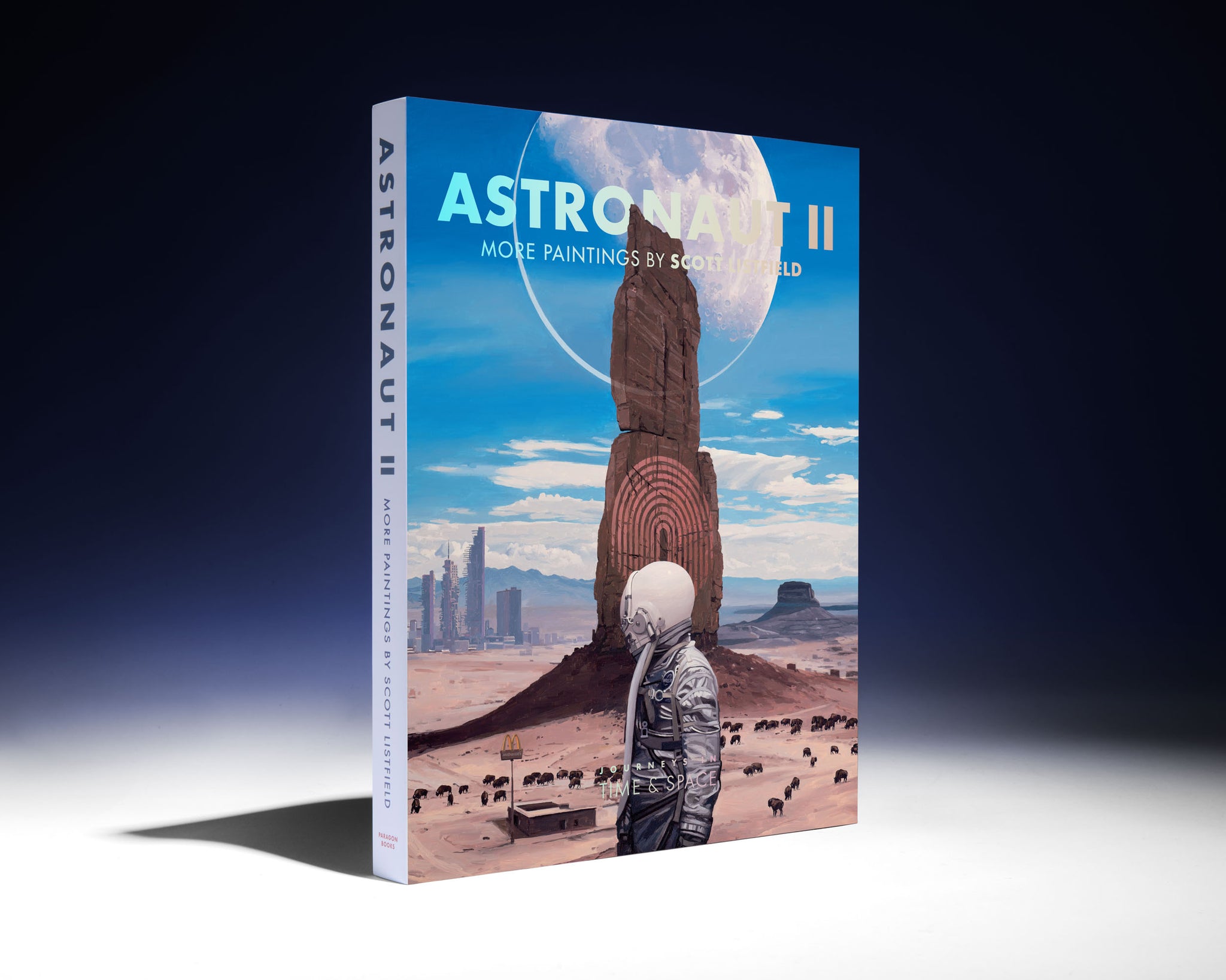 Book titled 'Astronaut II' with a cover featuring an astronaut and desert landscape.