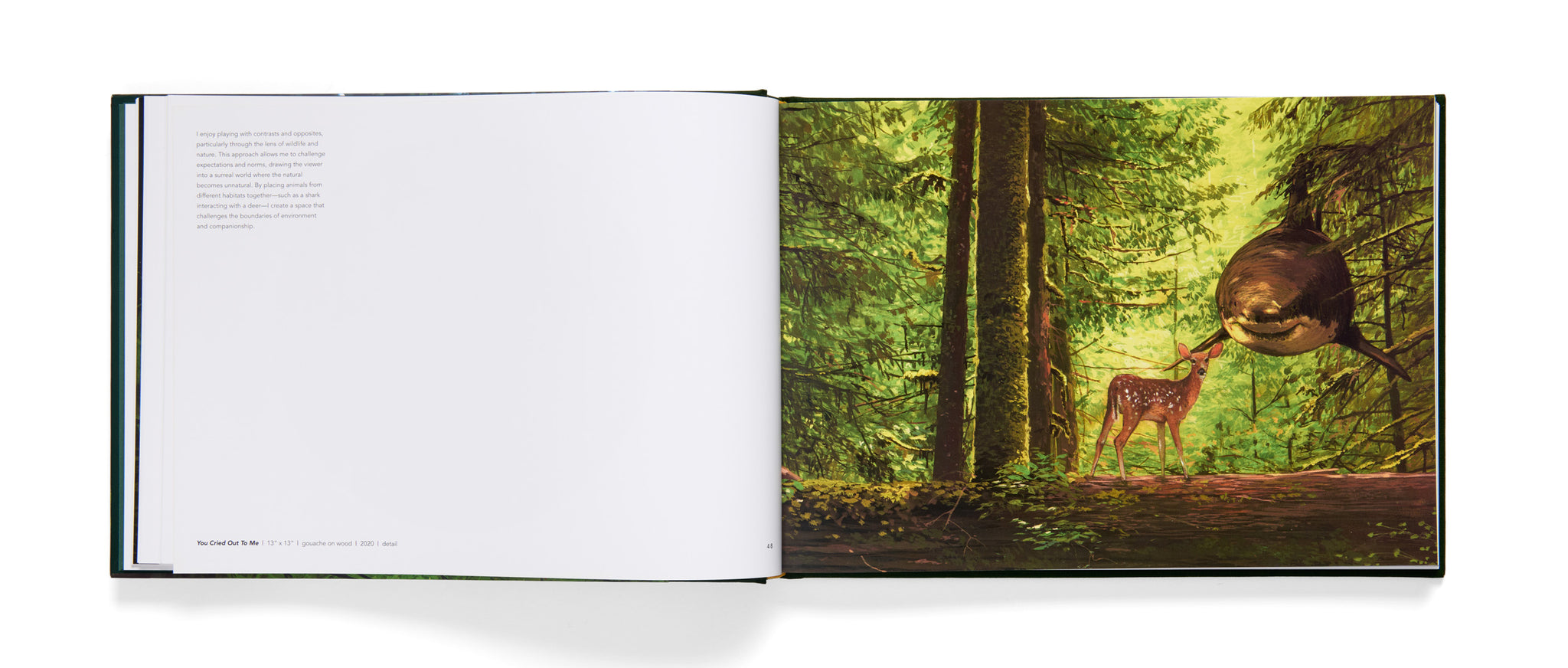 Open book with a nature-themed illustration of a deer and owl in a forest on a white background